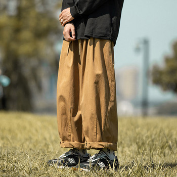 Широк модел мъжки панталон с джоб и връзки