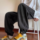 Pantaloni sport barbati cu elastic pe picior