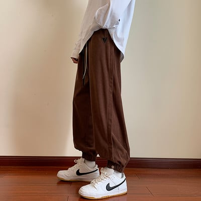 Pantaloni sport barbati cu elastic pe picior