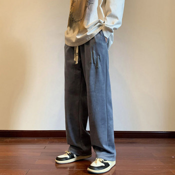 Свободен модел мъжки панталон с връзки и  надпис