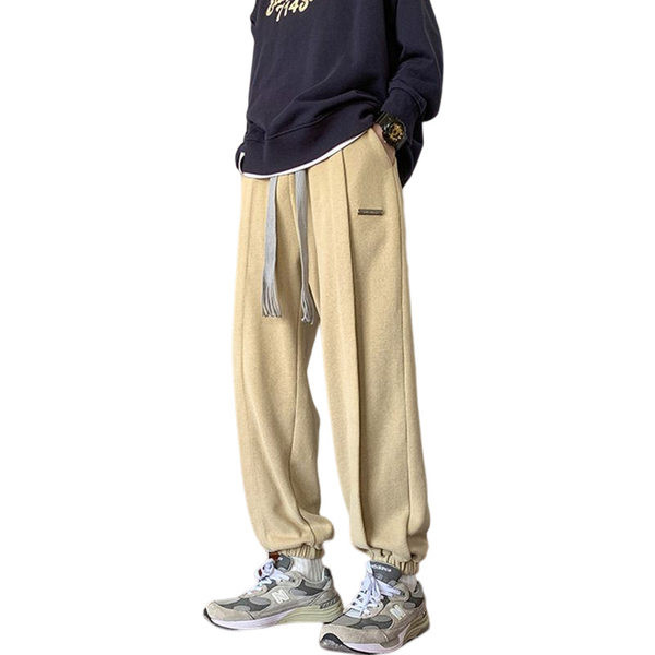 Športové pánske nohavice s elastickými viazaniami a nápisom