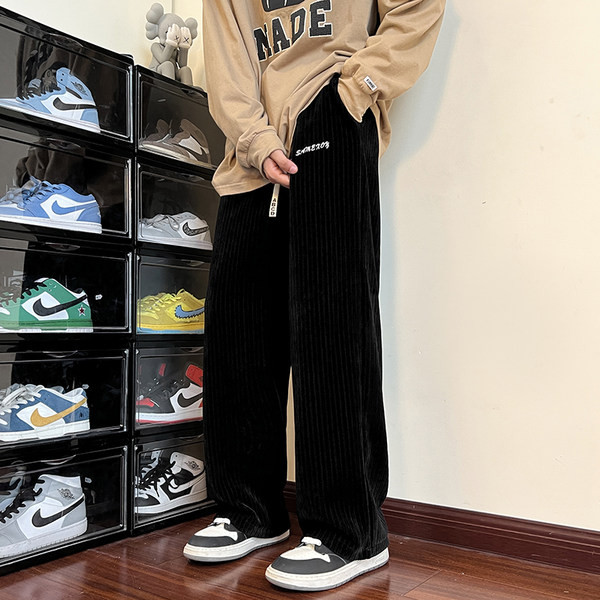 Széles szárú nadrág fűzővel és felirattal