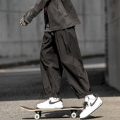 Pantaloni casual cu sireturi si picioare elastice