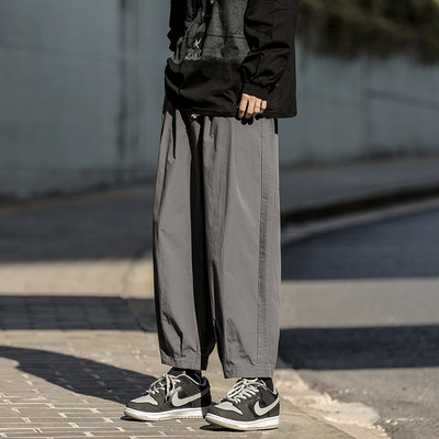 Pantaloni casual cu sireturi si picioare elastice