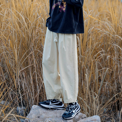 Pantaloni casual cu sireturi si picioare elastice