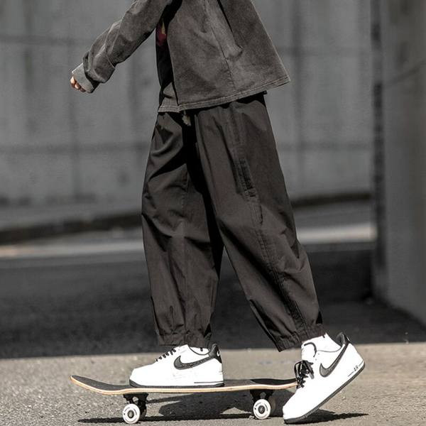 Pantaloni casual cu sireturi si picioare elastice