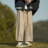 Široké pánske nohavice v čiernej a béžovej farbe