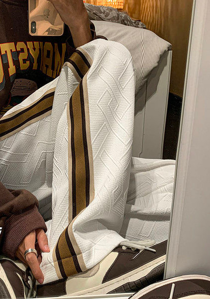 Vyriškos kelnės su raišteliais ir raišteliais