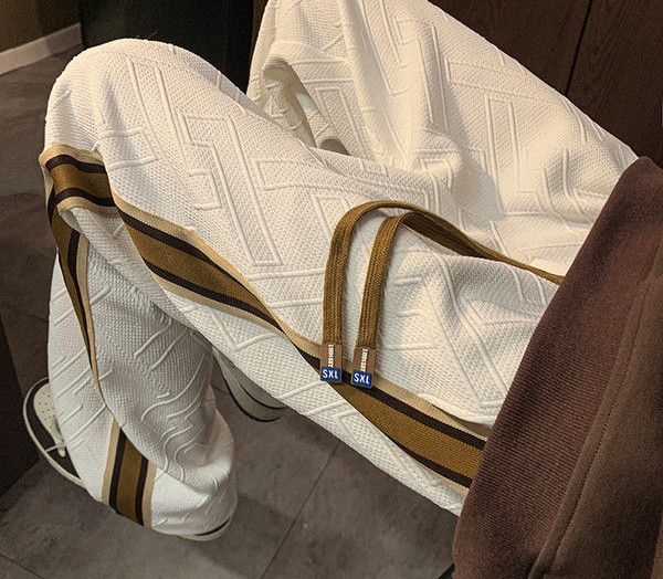 Vyriškos kelnės su raišteliais ir raišteliais