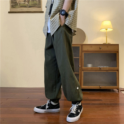 Pánske športové nohavice s logom a gumou na nohaviciach