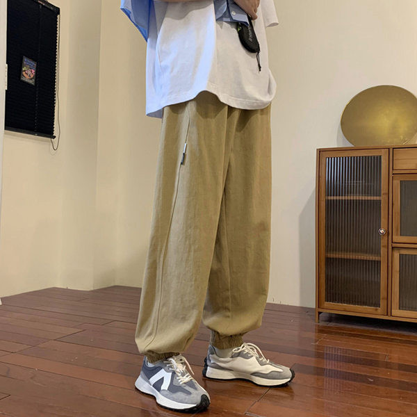 Pánske športové nohavice s logom a gumou na nohaviciach