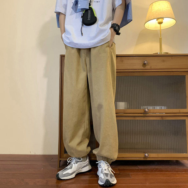 Pánske športové nohavice s logom a gumou na nohaviciach