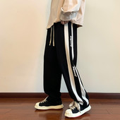 Ležerne sportske hlače za muškarce s printom i pasovima