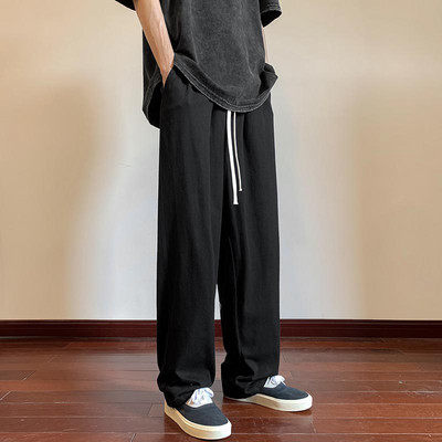 Moderné pánske nohavice s vreckami a šnúrkami rovného strihu