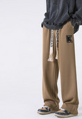 Pantaloni sport barbati cu sireturi si broderii