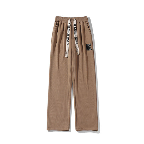 Pantaloni sport barbati cu sireturi si broderii