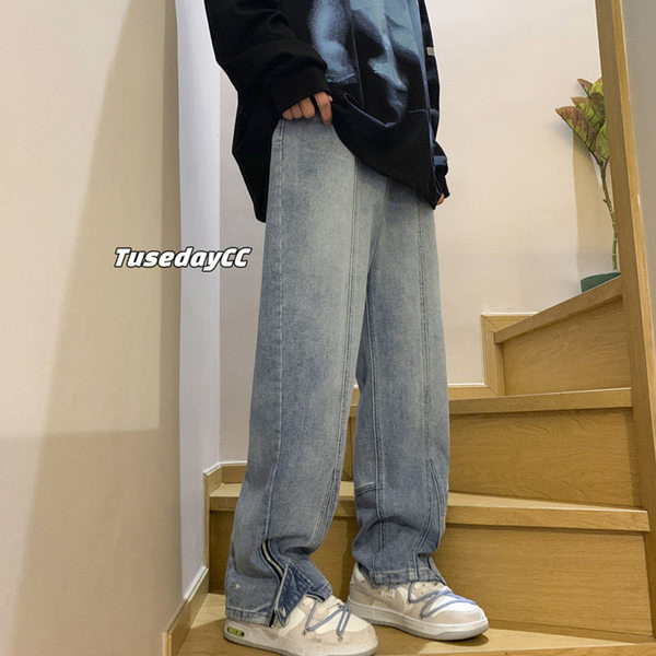 Pantaloni barbati cu fermoar si nasture la picioare - model lat