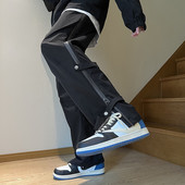 Pánske ležérne nohavice so zipsom a gombíkmi