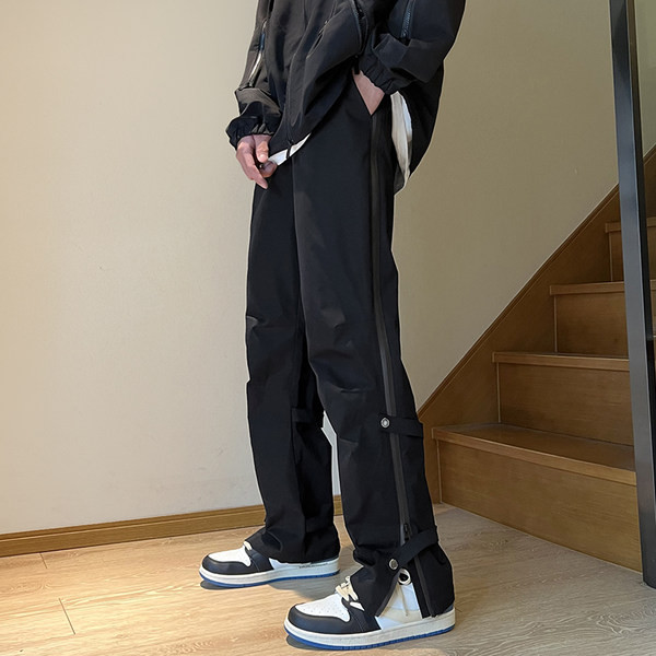 Pánske ležérne nohavice so zipsom a gombíkmi