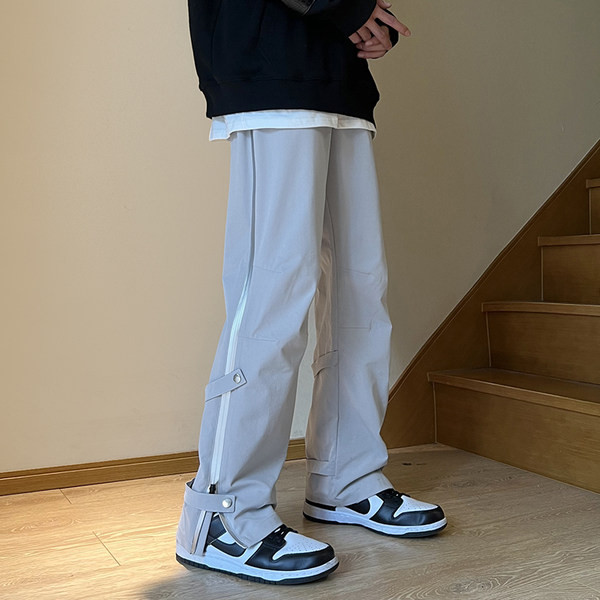 Pánske ležérne nohavice so zipsom a gombíkmi