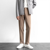 Pantaloni moderni de barbati cu buzunare de culoare maro