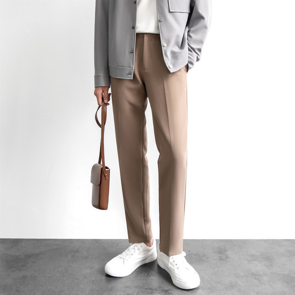 Pantaloni moderni de barbati cu buzunare de culoare maro