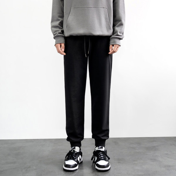 Pánske športové nohavice so šnúrkami a vreckom vhodné na každodenné nosenie