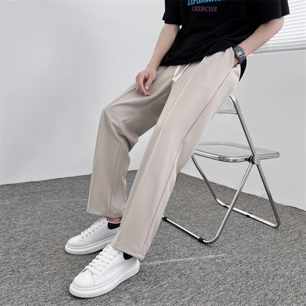 Pantaloni de bărbați cu șireturi și buzunar