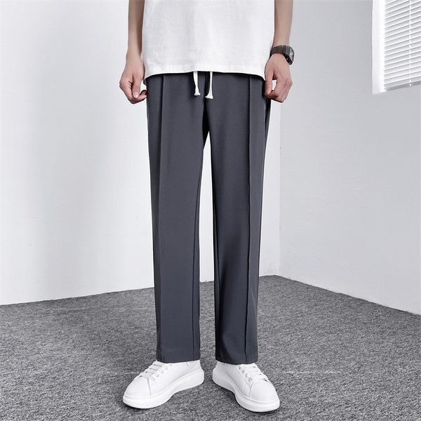 Pantaloni de bărbați cu șireturi și buzunar