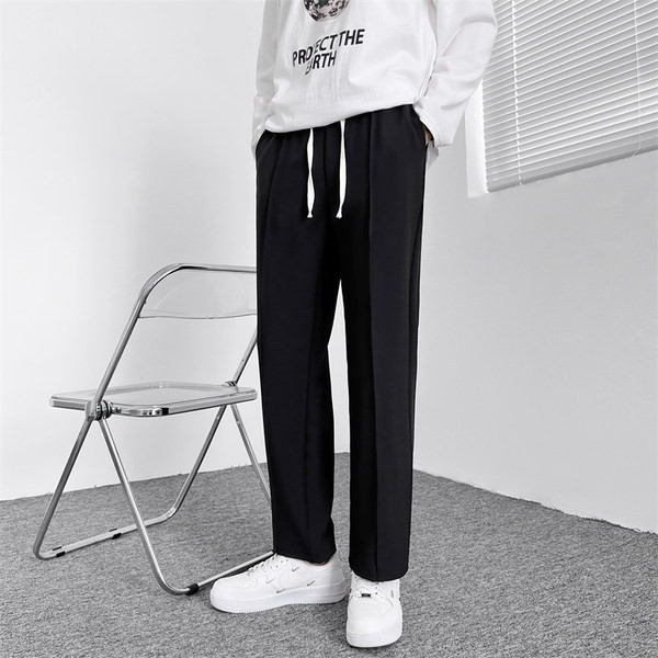 Pantaloni de bărbați cu șireturi și buzunar