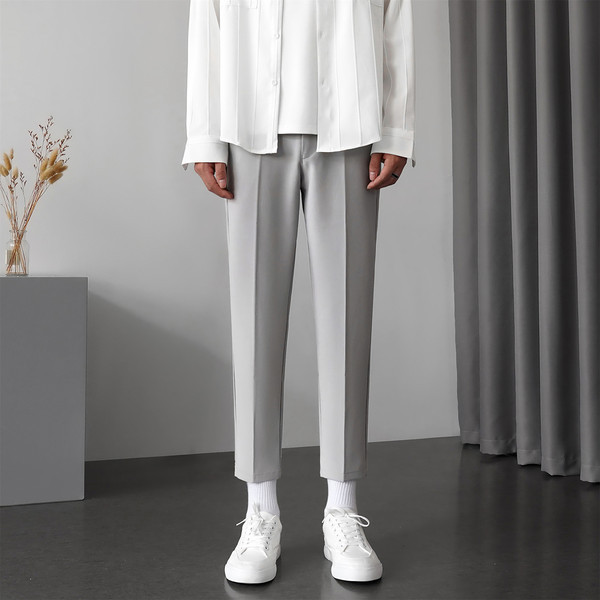 Pantaloni eleganti pentru barbati cu fermoar si nasturi