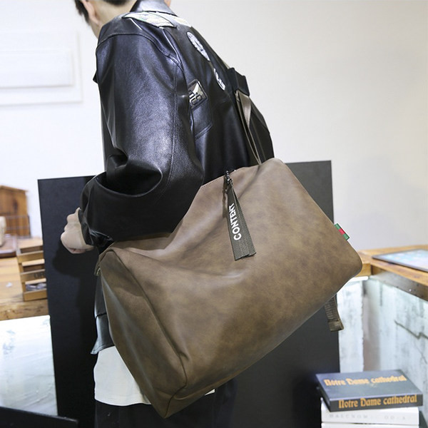 Denná kabelka z eko kože s dlhým uchom a nápisom