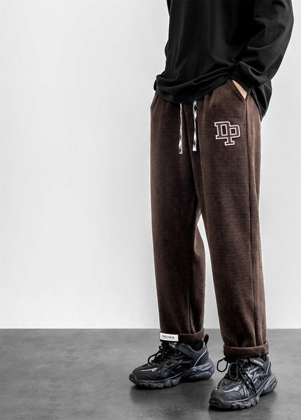 Pánske tepláky s výšivkou a šnúrkami