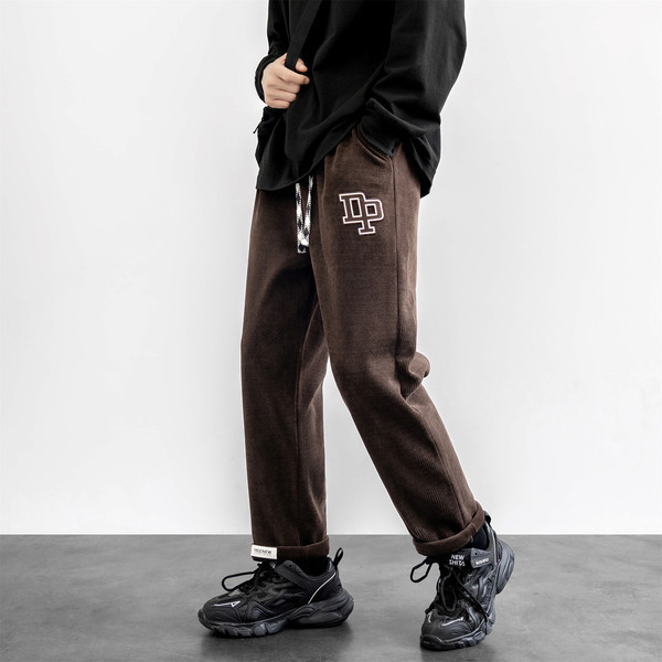 Pánske tepláky s výšivkou a šnúrkami