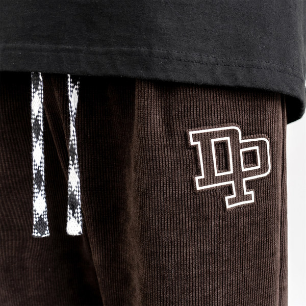 Pánske tepláky s výšivkou a šnúrkami