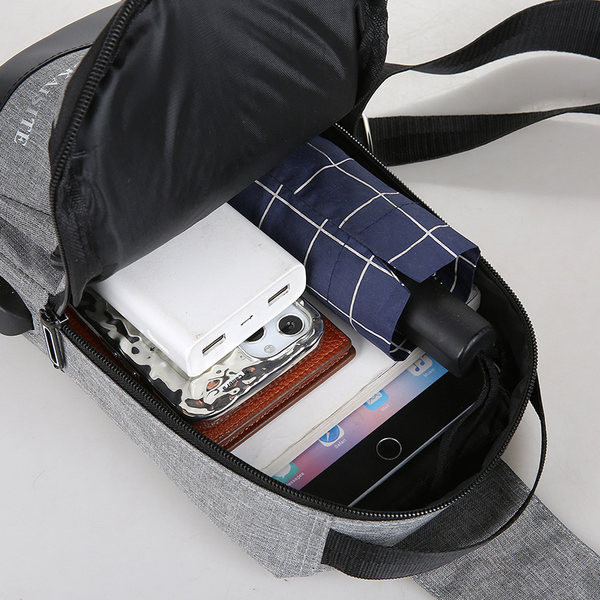 Ανδρική υφασμάτινη τσάντα με ένα χερούλι και πολλές θήκες