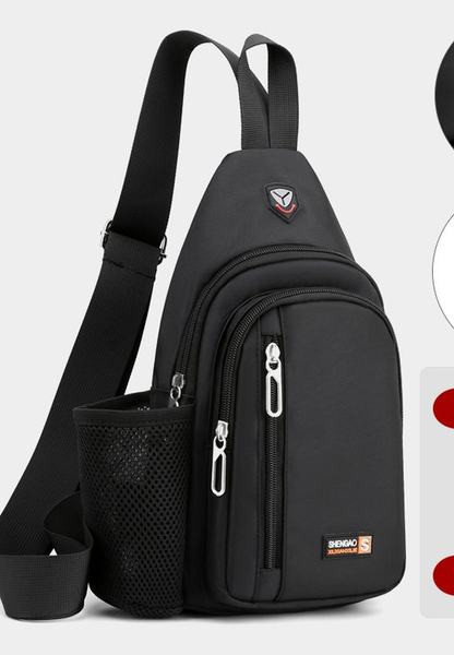 Mala tekstilna torba za rame s nekoliko pretinaca