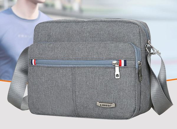 Jauna modeļa vīriešu audekla soma ar vairākiem nodalījumiem