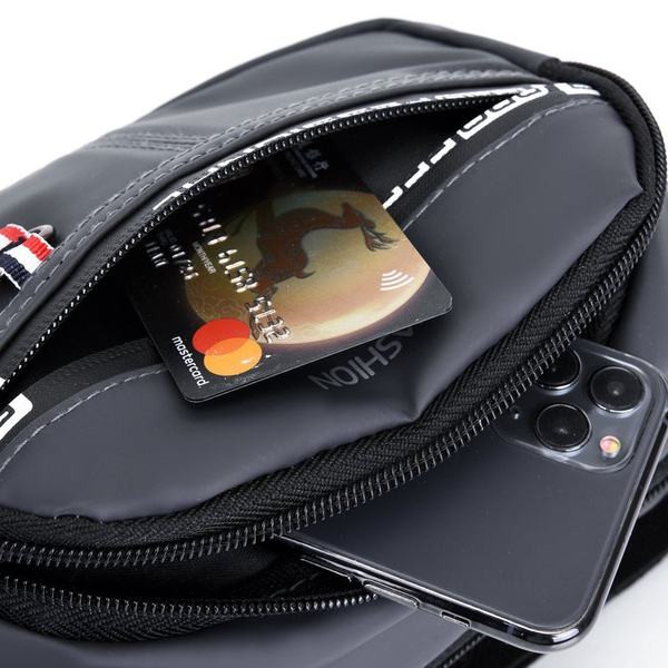 Tekstilna muška torbica oko struka sa natpisom i patentnim zatvaračem