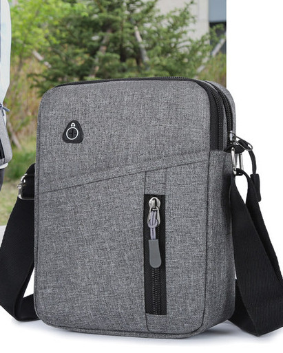 Muška tekstilna torba s patentnim zatvaračem