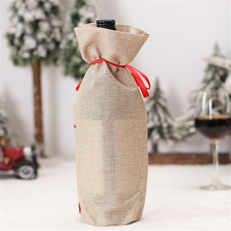 Karácsonyi asztaldísz kellékek Rajzfilm vörösboros üveg tele borospohár karácsonyi bordugók koszorúslány táska