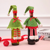 Vianočná škriatka, sada fliaš červeného vína, šampanské, dekorácia s obalom na červené víno na sviatočnú večeru, barové potreby, sukňa, roztomilá vianočná dekorácia