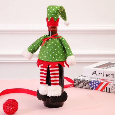 Vianočná škriatka, sada fliaš červeného vína, šampanské, dekorácia s obalom na červené víno na sviatočnú večeru, barové potreby, sukňa, roztomilá vianočná dekorácia