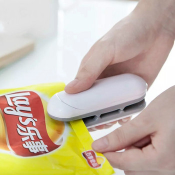 Φορητό μίνι στεγανοποιητικό οικιακό μηχάνημα στεγανοποίησης θερμότητας συσκευασίας Σακούλα αποθήκευσης Κλιπ Πλαστική τσάντα τροφίμων Κλείσιμο γκάτζετ κουζίνας