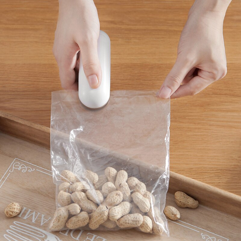 Mini mașină de etanșare a alimentelor Mașină de etanșare termică în vid din plastic de mână