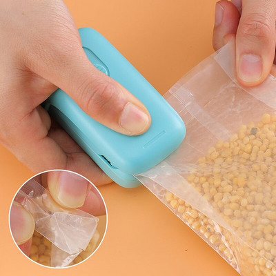 2 in 1 Mini Slide Heat Sealer Nešiojami dangteliai Maisto taupymo Buitinė rankinė sandarinimo pakavimo mašina įvairiems plastikiniams maišeliams