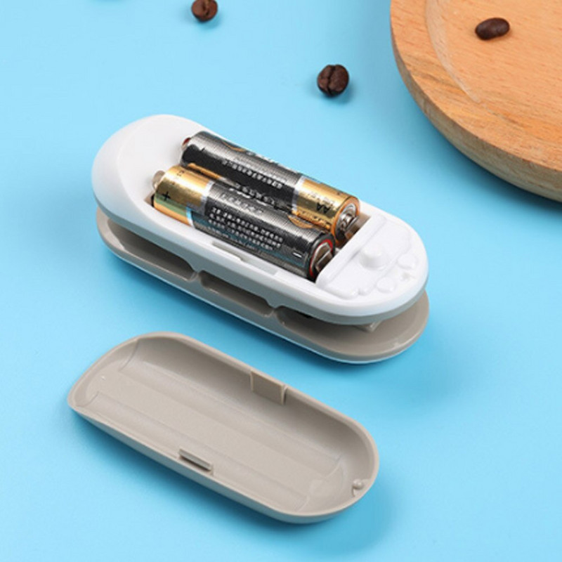 Nešiojamas rankinis šiluminio sandarinimo įtaisas su akumuliatoriumi maitinamas maišelių sandariklis ir pjaustytuvas su kabliu plastikiniams maišeliams maisto laikymui