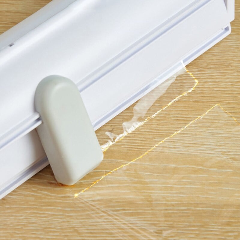 Kuhinjski dozator za folije za hranu Magnetska folija za pričvršćivanje bez probijanja Prianjajuća folija Plastični rezač Oštra klizna oštrica Držač za pohranu