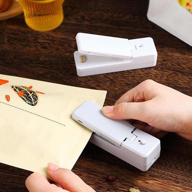 USB mini tesniace zariadenia 2 v 1, nabíjateľné ručné tepelné tesniace zariadenia s rezacím nožom na skladovanie potravín v plastových vreckách
