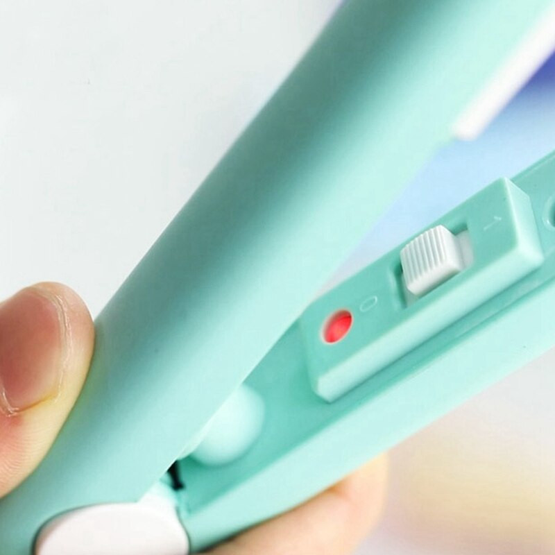 Kreativni praktični kućanski mini prijenosni višenamjenski vakuumski zatvarač za vrećice za hranu Ručni električni stroj za toplinsko zavarivanje